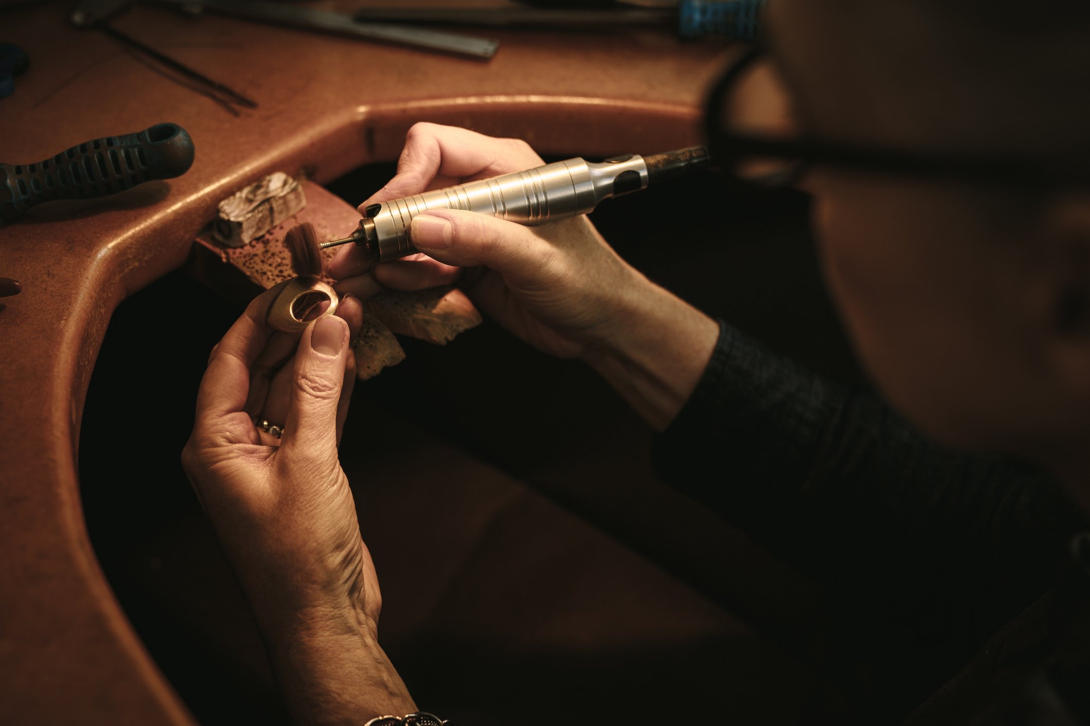 Jewelry Designer Polishing a Ring