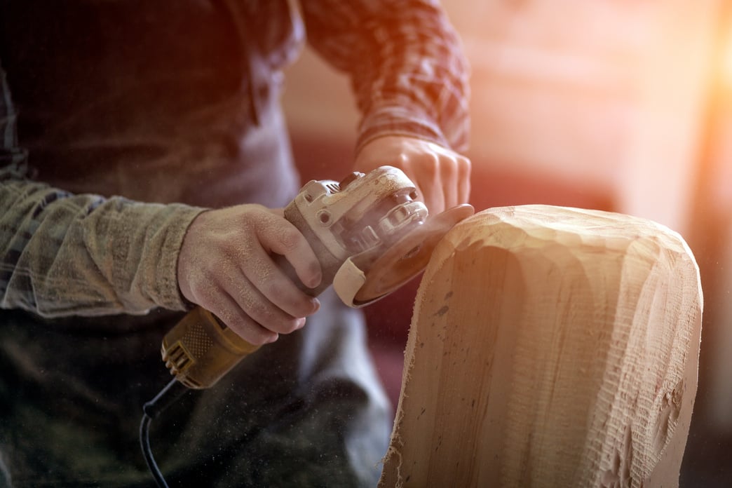 Man Carving Wood